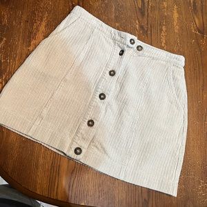 cream colored button skirt